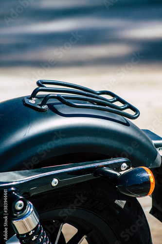 Closeup of a motorcycle parked in the streets of the city center of the metropolitan area 