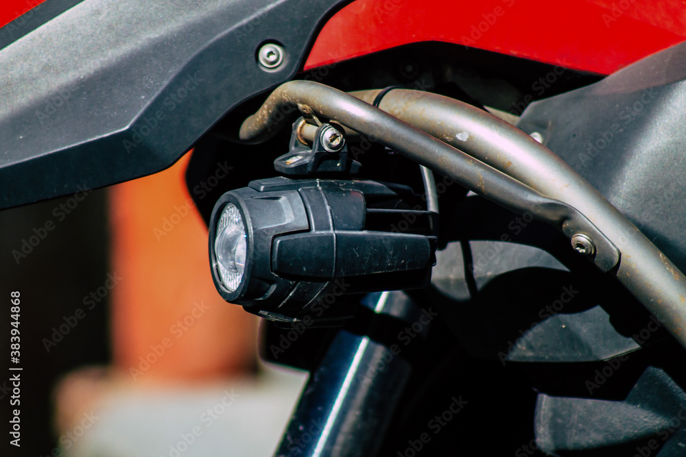 Closeup of a motorcycle parked in the streets of the city center of the metropolitan area
Closeup of a motorcycle parked in the streets of the city center of the metropolitan area