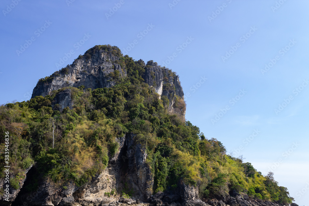 green-lined mountain against blue sky, Thailand, Krabi