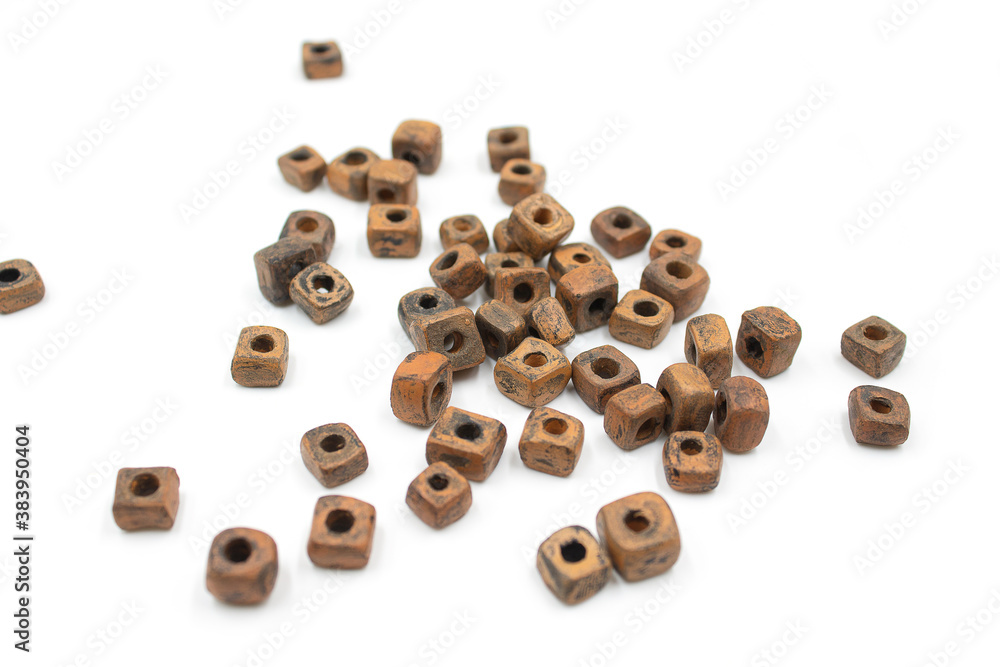 Ceramic bead made of baked clay square shape with blackening Ceramic bead made of baked clay square shape with blackening