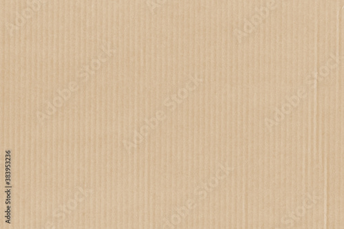 A vintage rough sheet of the carton with a gradient color. Recycled environmentally friendly retro cardboard paper texture. Simple and bright minimalist papercraft background.