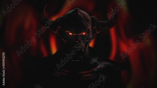 Animation of the appearance of a devil from the darkness or fire. Horror or religion scene.