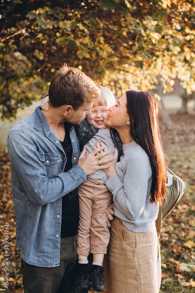 Family playing in autumn park having fun. Family playing in autumn park having fun.