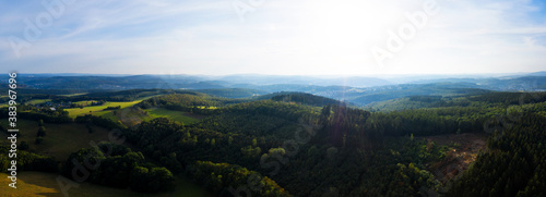 forest hills in the evening sun as a high definition panorama © Tobias Arhelger