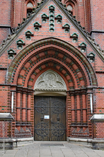Intricate brickwork around the doorway of a church in Hamburg, Germany