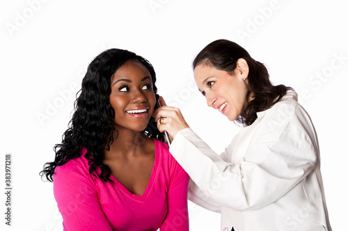 Doctor checking ear for infection photo