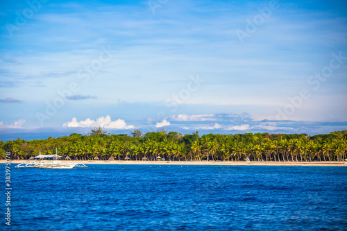 Landscape of tropical island beach with perfect blue sky in Bohol photo