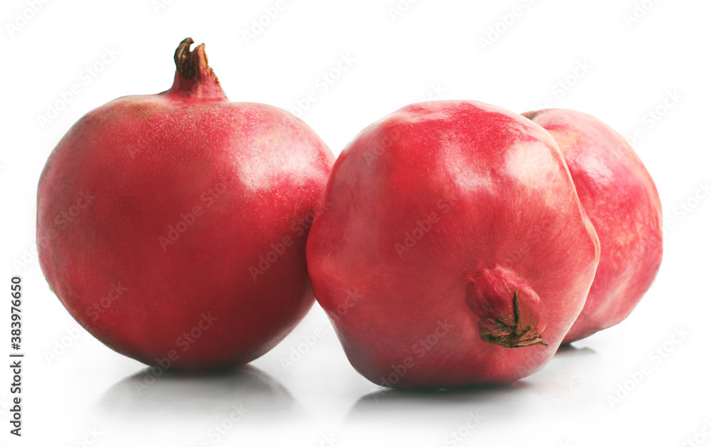 Fresh pomegranate isolated on a white background. Group. Side view Fresh pomegranate isolated on a white background. Group. Side view