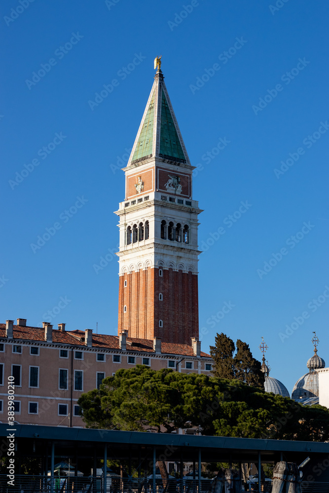 A view towards St Mark`s Campanile as it overlooks the Grand Canal
