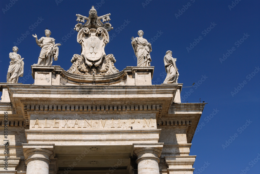 Detail of Statues and Vatican coat of arms on St Peters piazza colonnades