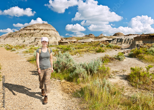 Hiker in badlands of Alberta, Canada