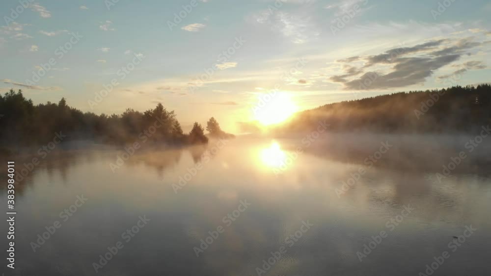 Flight on the drone over the river covered with mist in the early morning Flight on the drone over the river covered with mist in the early morning