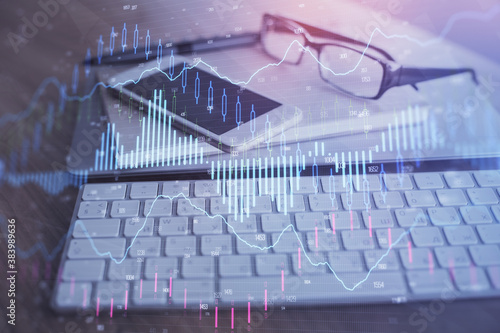 Double exposure of forex chart drawing and cell phone background. Concept of financial trading