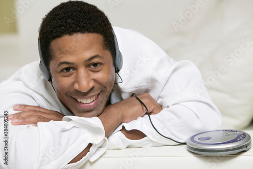 Man Listening to Music on Headphones photo
