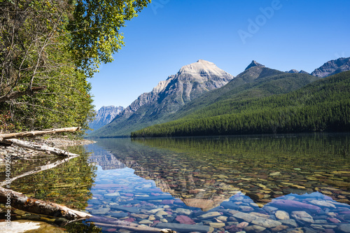 Fototapeta Naklejka Na Ścianę i Meble -  Clear Reflection of Mountains in Lake Bowman in Glacier National Park