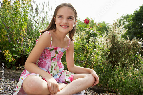 Obraz na płótnie Girl Sitting in Meadow