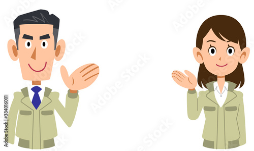 手のひらで案内する工務店の男女の上半身
