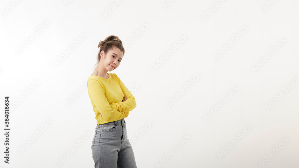 Portrait of smiling young woman with arms crossed Portrait of smiling young woman with arms crossed