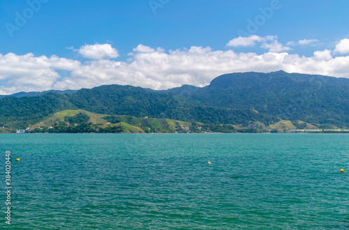 Quiet view of the sea, on the coast of Ilhabela. In the background, part of the city of São Sebastião. Brazil © Everson Bueno