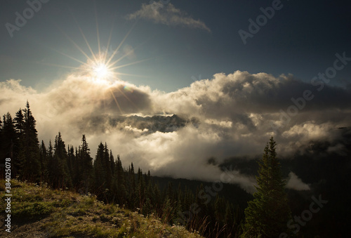 sunrise over the cascade mountains and foggy clouds