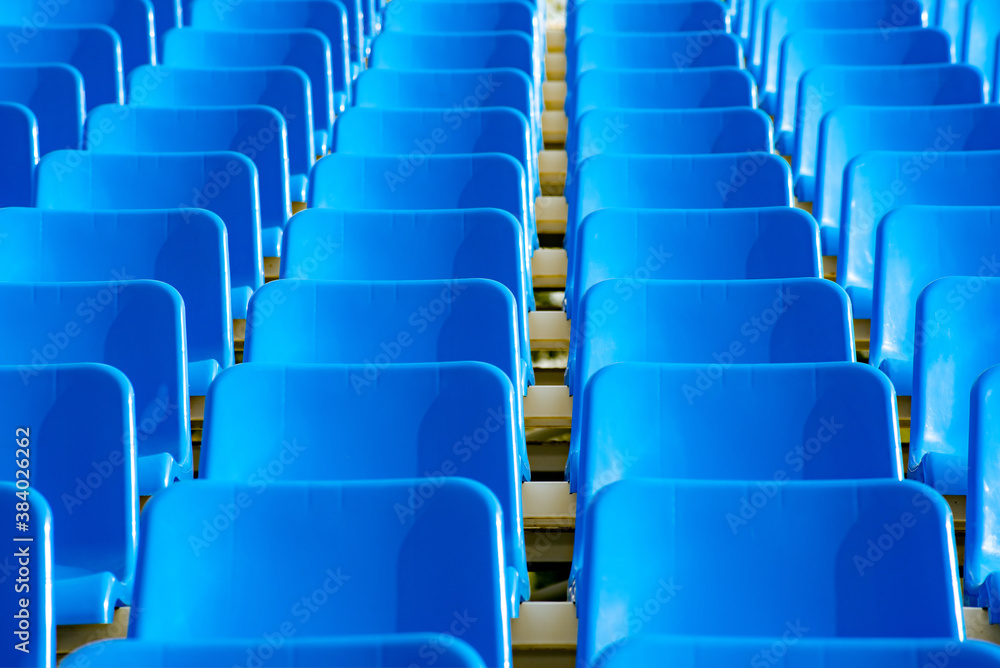 Obraz premium geometric photo of a set of blue seats on a street grandstand for watching sports
