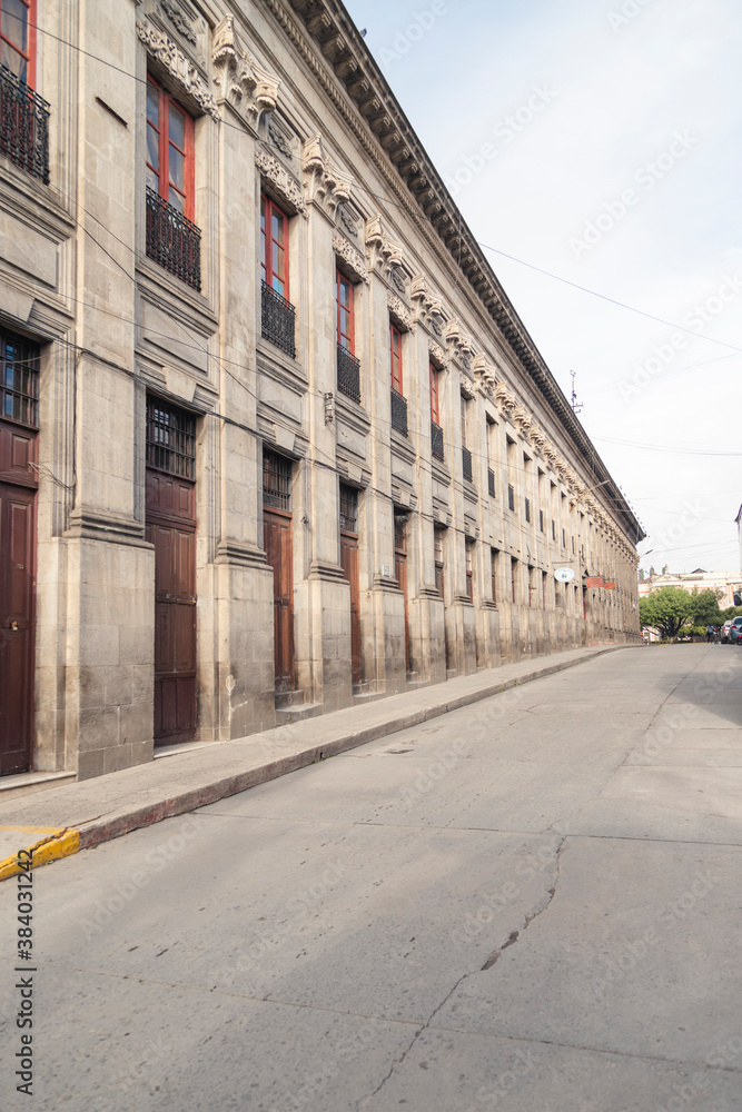 Obraz premium Ancient and romantic stone street of colonial city -Streets of Quetzaltenango in the historic center of the city