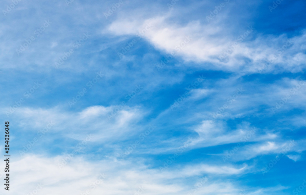 Blue sky background with wispy clouds Blue sky background with wispy clouds