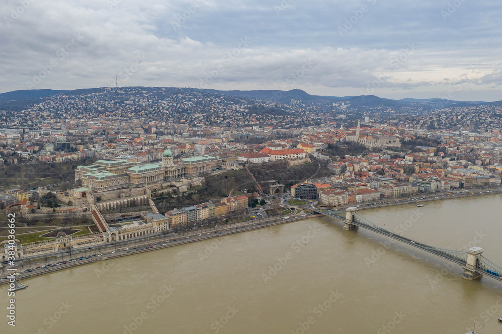 Aerial drone shot of Buda Castle on the hill in Budapest winter morning
