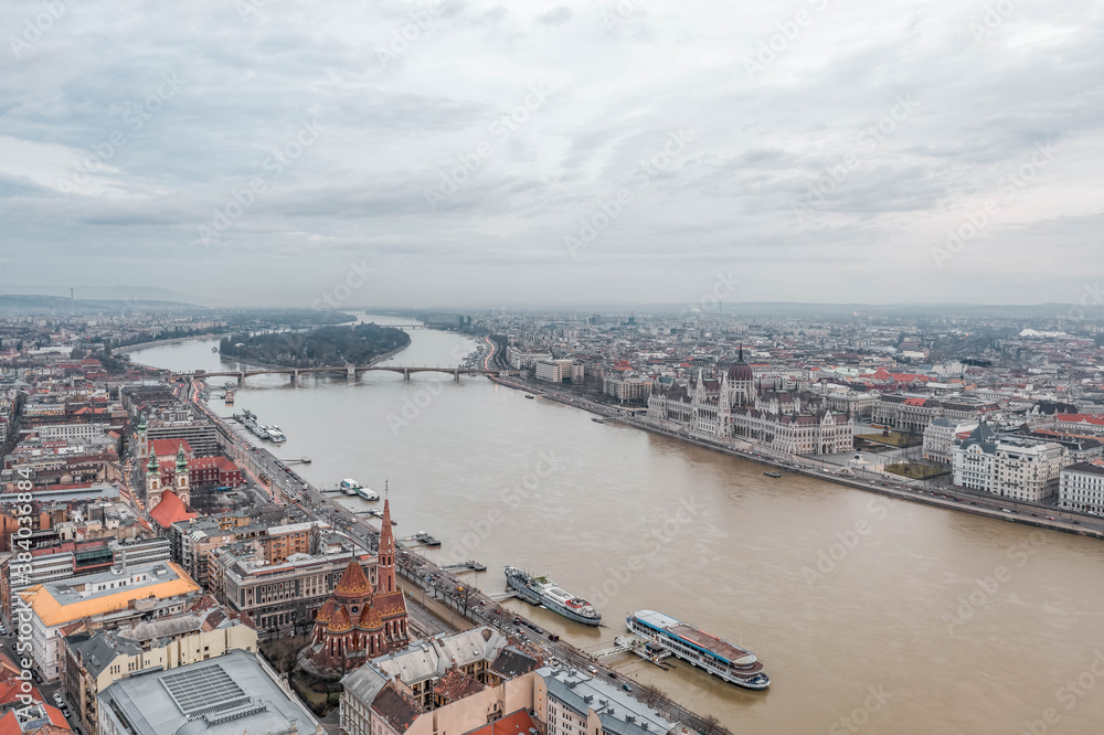 Aerial pano drone view of Hungarian Parliament and Margaret island in Danube at winter dawn Aerial pano drone view of Hungarian Parliament and Margaret island in Danube at winter dawn