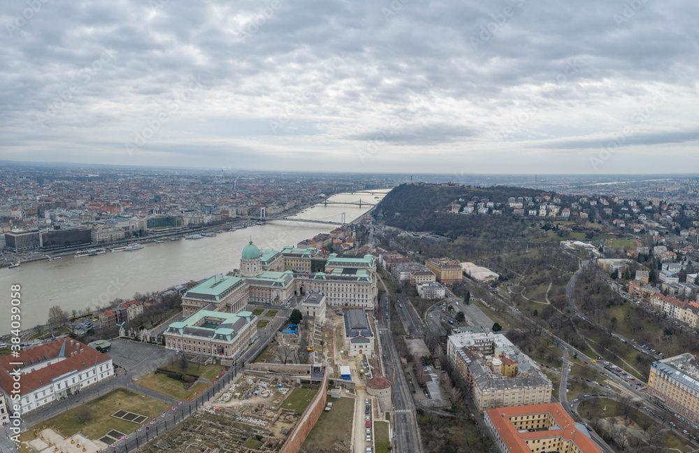 Aerial drone shot of Buda Castle on the hill in Budapest winter morning Aerial drone shot of Buda Castle on the hill in Budapest winter morning