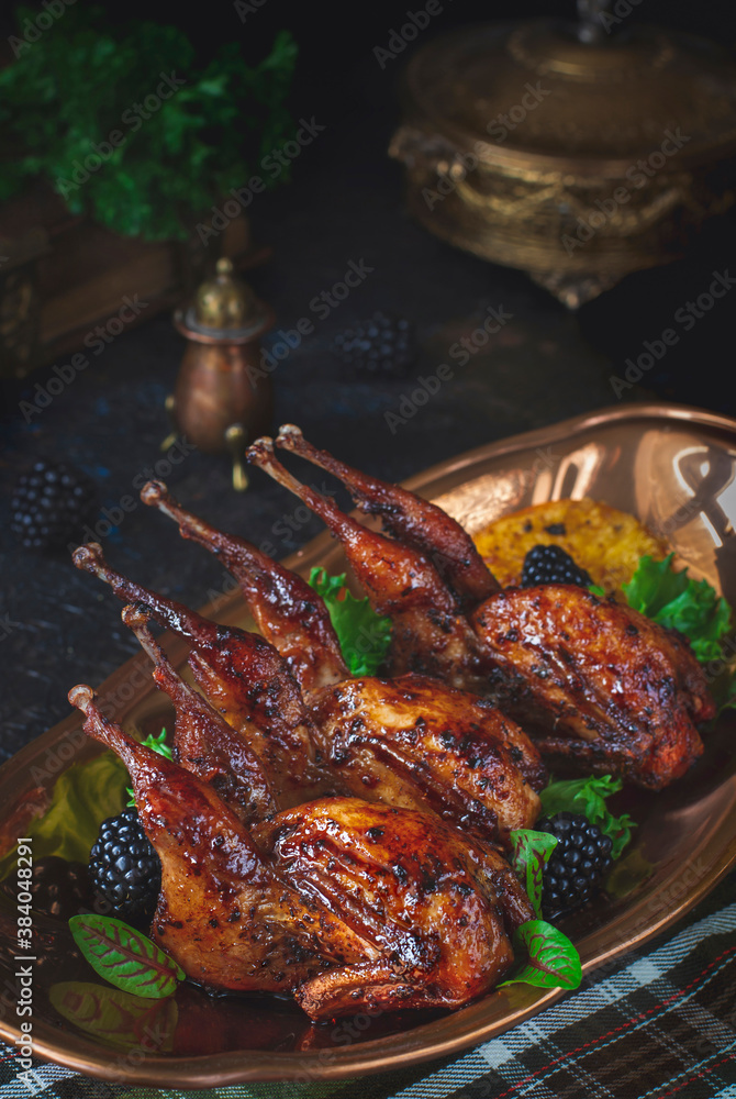 Roasted quails with oranges and berries Roasted quails with oranges and berries