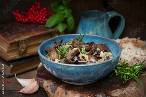 Marinated wild mushrooms (Leccinum aurantiacum or red-capped Scaber Stalk) with onions and fresh herbs 