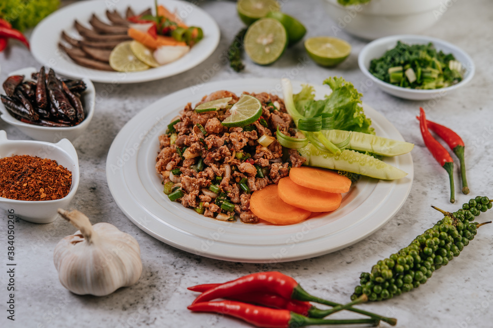 Pork Larb with carrot, cucumber, lime, spring onion, chili, freshly ground pepper, and lettuce Pork Larb with carrot, cucumber, lime, spring onion, chili, freshly ground pepper, and lettuce