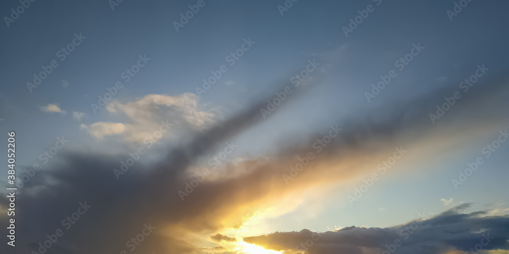 Evening sky, clouds, sun and sunset