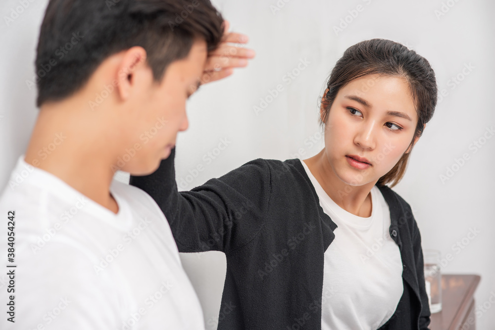 The sick man had a woman look and touch his forehead. The sick man had a woman look and touch his forehead.