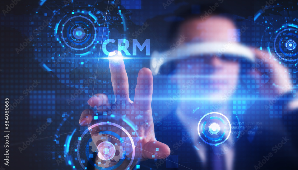 Obraz premium Business, technology, internet and network concept. Young businessman thinks over the steps for successful growth: CRM