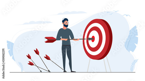 The guy is holding an arrow. The arrow hits the target. The concept of successful business, teamwork and achieving goals. Vector.