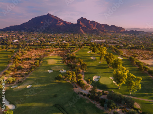 Late evening sun glowing red on Camelback Mountain in Phoenix, Scottsdale, Arizona,USA photo