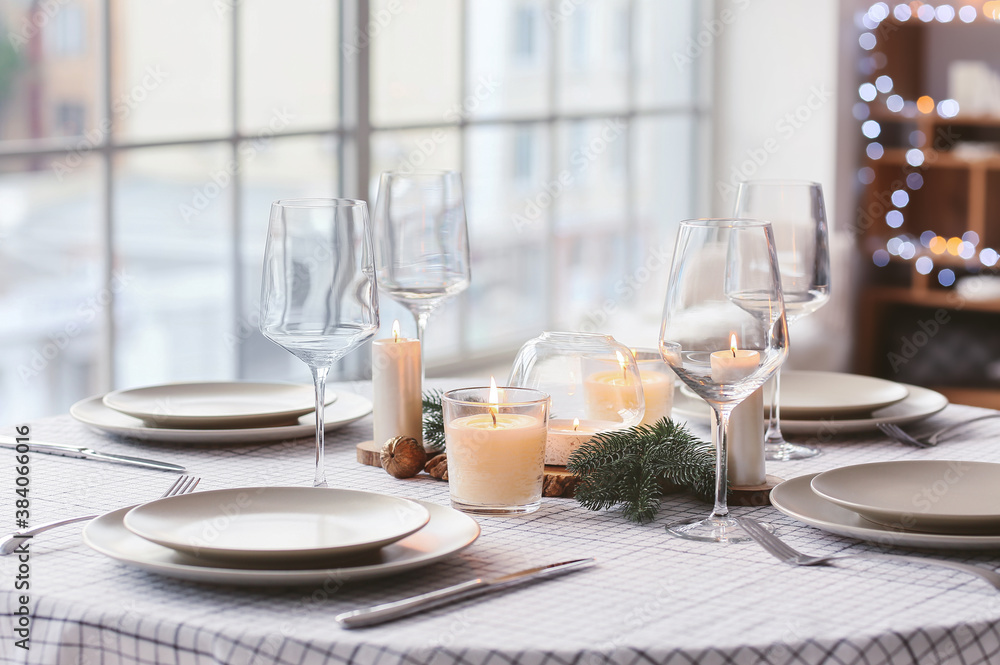 Fototapeta premium Beautiful table setting with Christmas decorations in living room