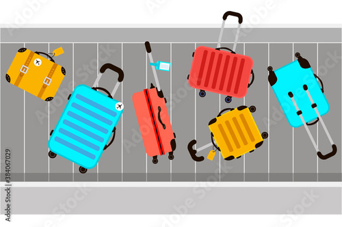 Suitcases on airport luggage conveyor belt. Travel bag. Summer time. Holidays. Vacation trip. Rest trip. Luggage band on the airport.