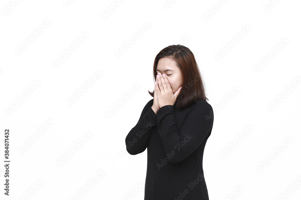 Portrait of Asian woman prays to God, praying gesture hands raised up over white background Portrait of Asian woman prays to God, praying gesture hands raised up over white background