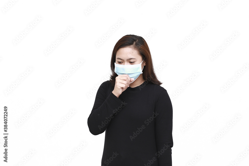 Young Asian woman wearing mask for protection from disease with isolated white background. Coronavirus concept. Indonesian woman wearing black shirt. Young Asian woman wearing mask for protection from disease with isolated white background. Coronavirus concept. Indonesian woman wearing black shirt.