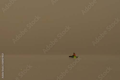 fisherman in the fog © Andrey