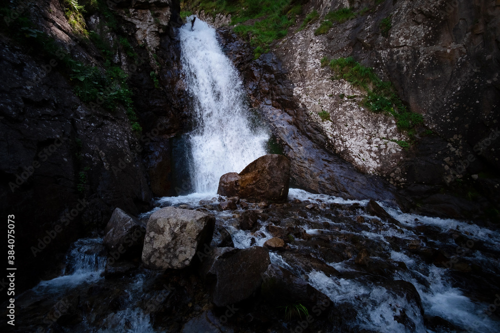 great full-blown Waterfall Shumka, Dombai, Karachay-Cherkessia, Russia great full-blown Waterfall Shumka, Dombai, Karachay-Cherkessia, Russia