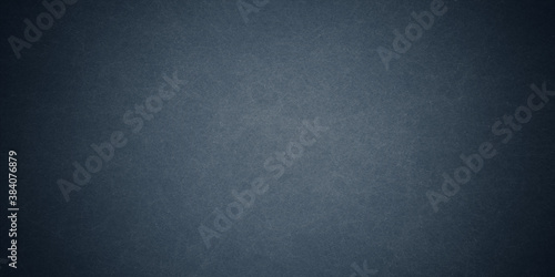 Texture of old navy blue paper closeup 