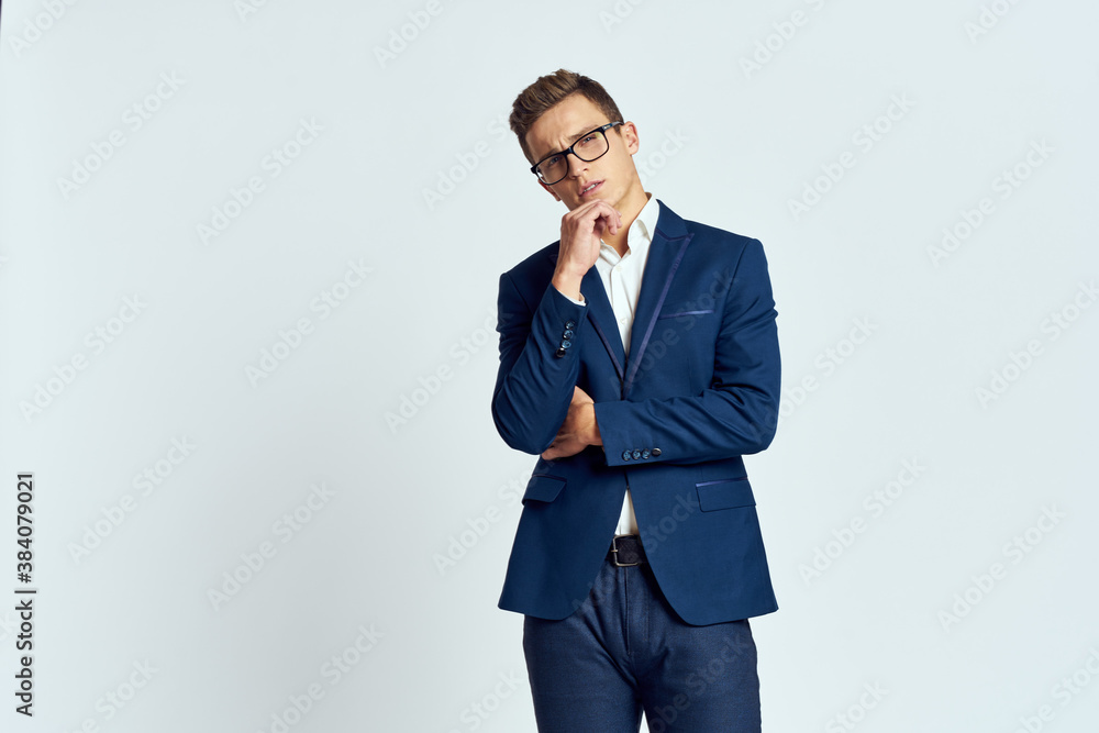 business man in suit wearing glasses self-confidence manager executive light background business man in suit wearing glasses self-confidence manager executive light background