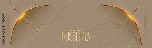 Happy dussehra festival celebration banner with bow and arrow vector photo