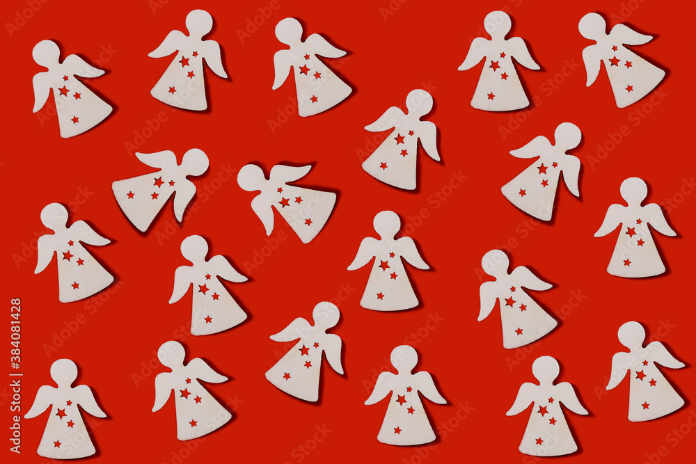 Christmas pattern. Repetition of the silhouette of an angel on a red background. Horizontal. Merry Christmas and New Year concept. Christmas pattern. Repetition of the silhouette of an angel on a red background. Horizontal. Merry Christmas and New Year concept.