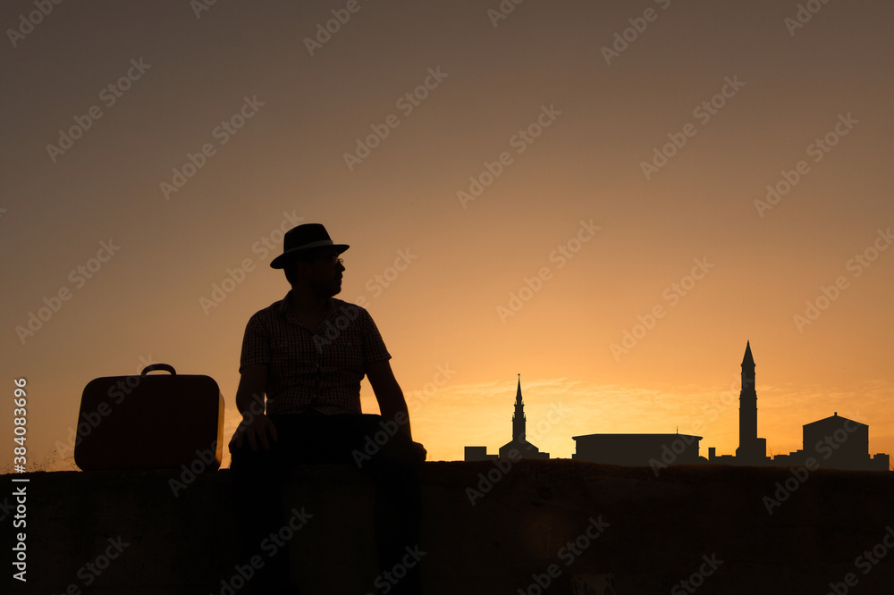 man in front of boston city skyline