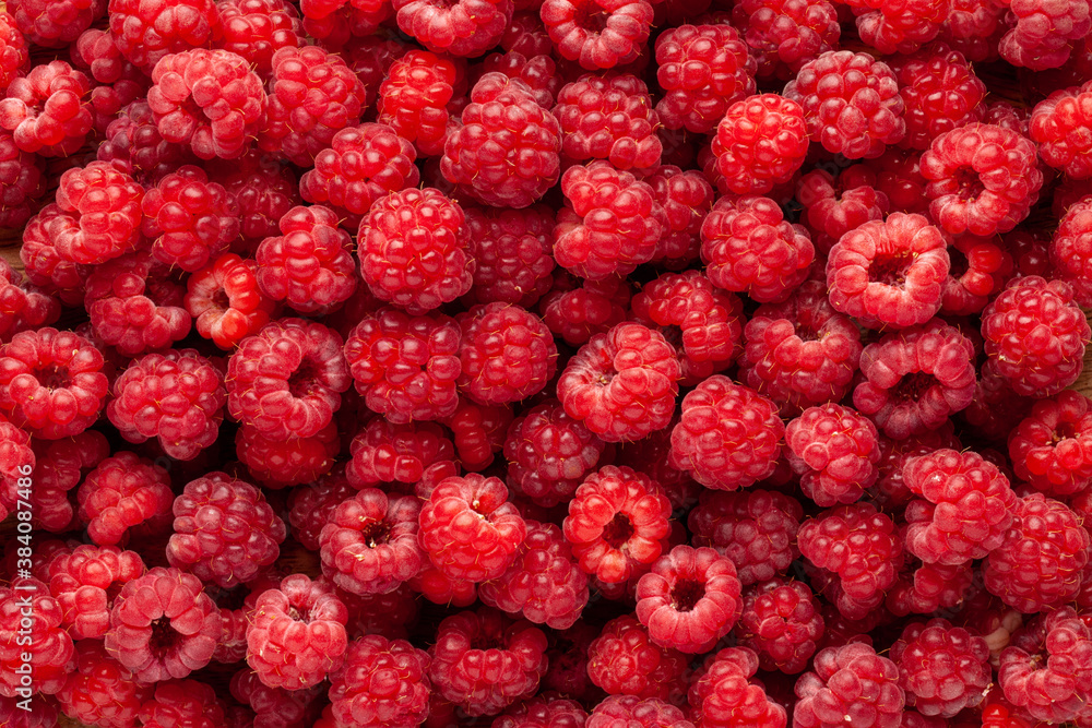 Raspberry background. Close-up. Top view Raspberry background. Close-up. Top view
